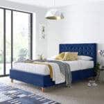 Zayne Blue Velvet Ottoman Bed